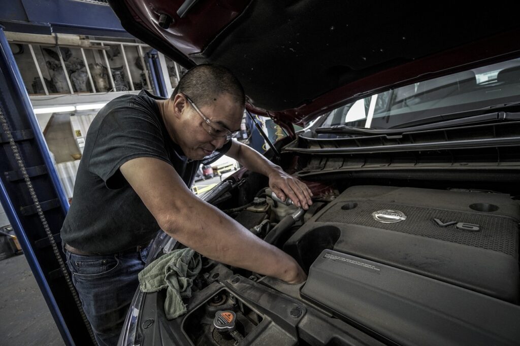 Mechanic working to fix automobile